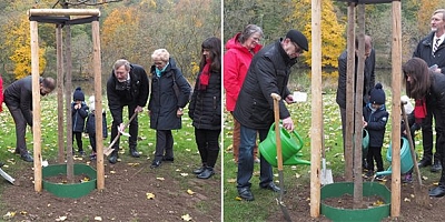 Almanya'da üç dinin temsilcisi birlikte elma ağacı dikti. 